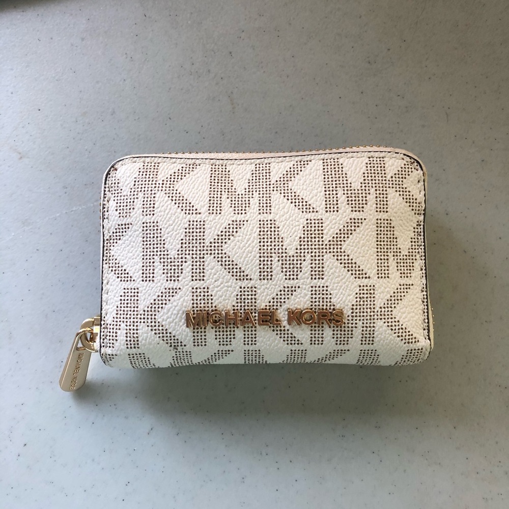 Michael Kors “small logo and leather wallet”